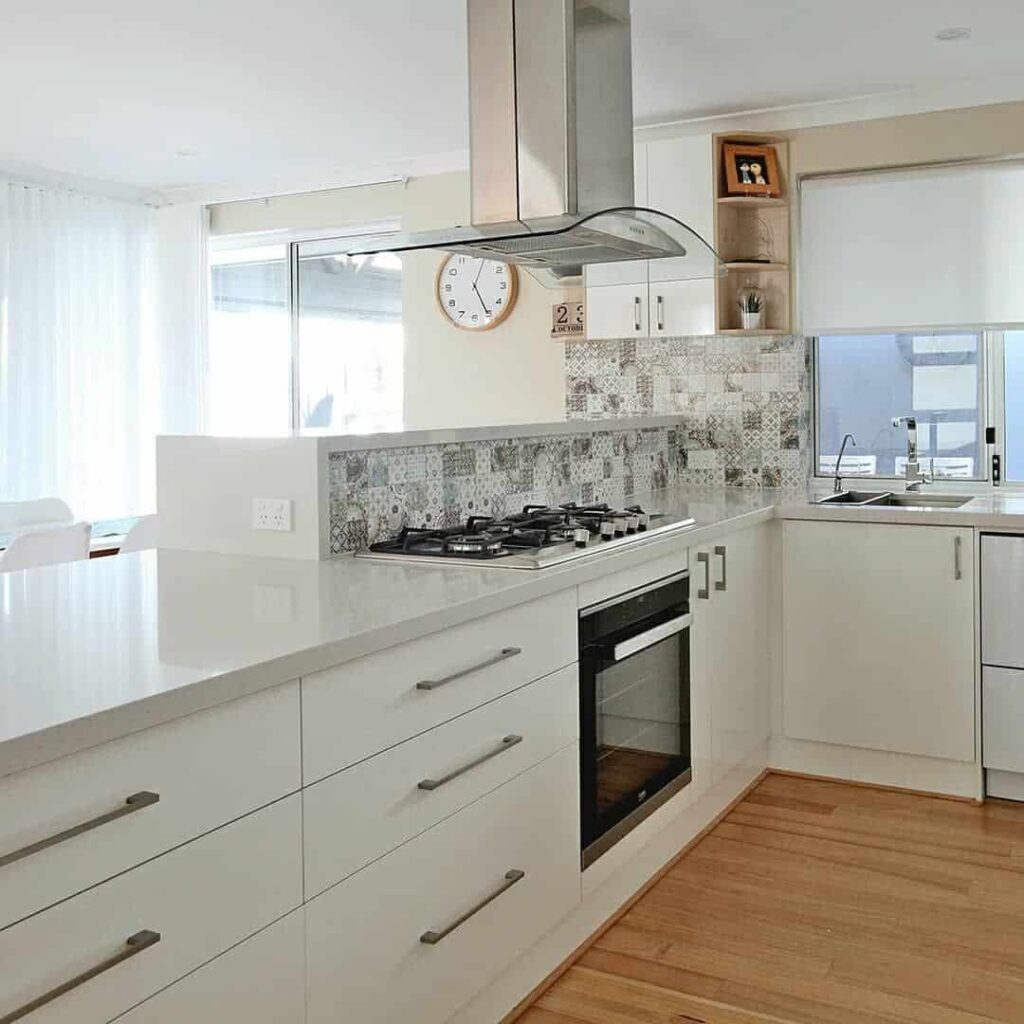 Custom waterproof PVC kitchen cabinets in Brevard County Florida with white modern design by Evolux Cabinets.