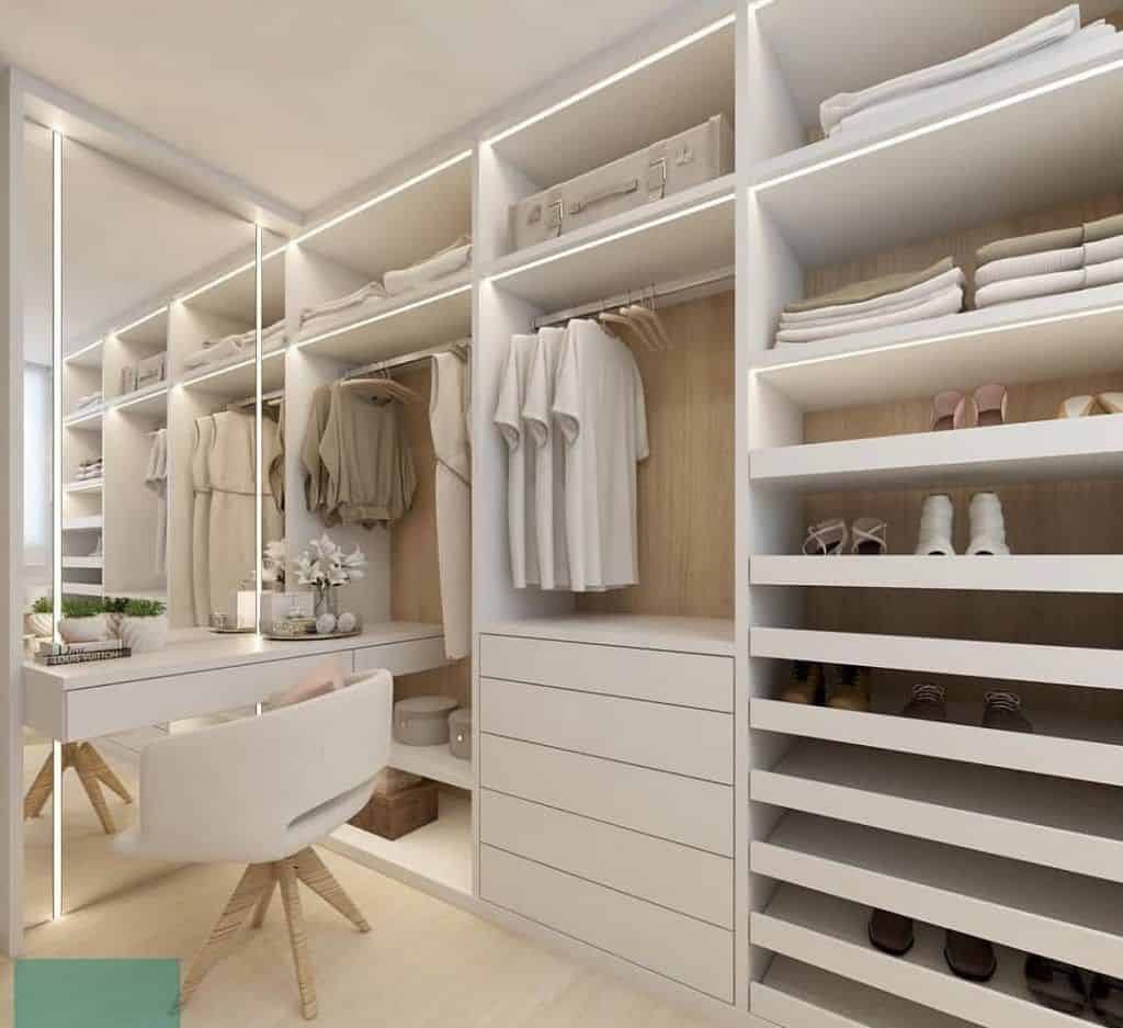Modern waterproof white PVC closet by Evolux Cabinets in Brevard County Florida — custom design with shelves, drawers, and LED lighting.