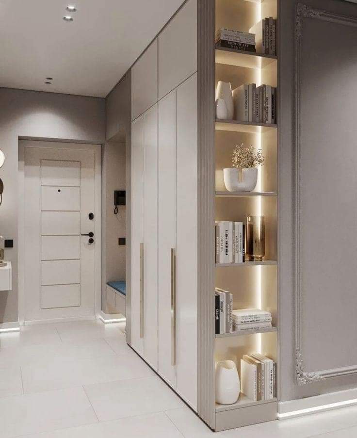 Modern entryway closet with LED-lit shelves and waterproof PVC design by Evolux Cabinets.