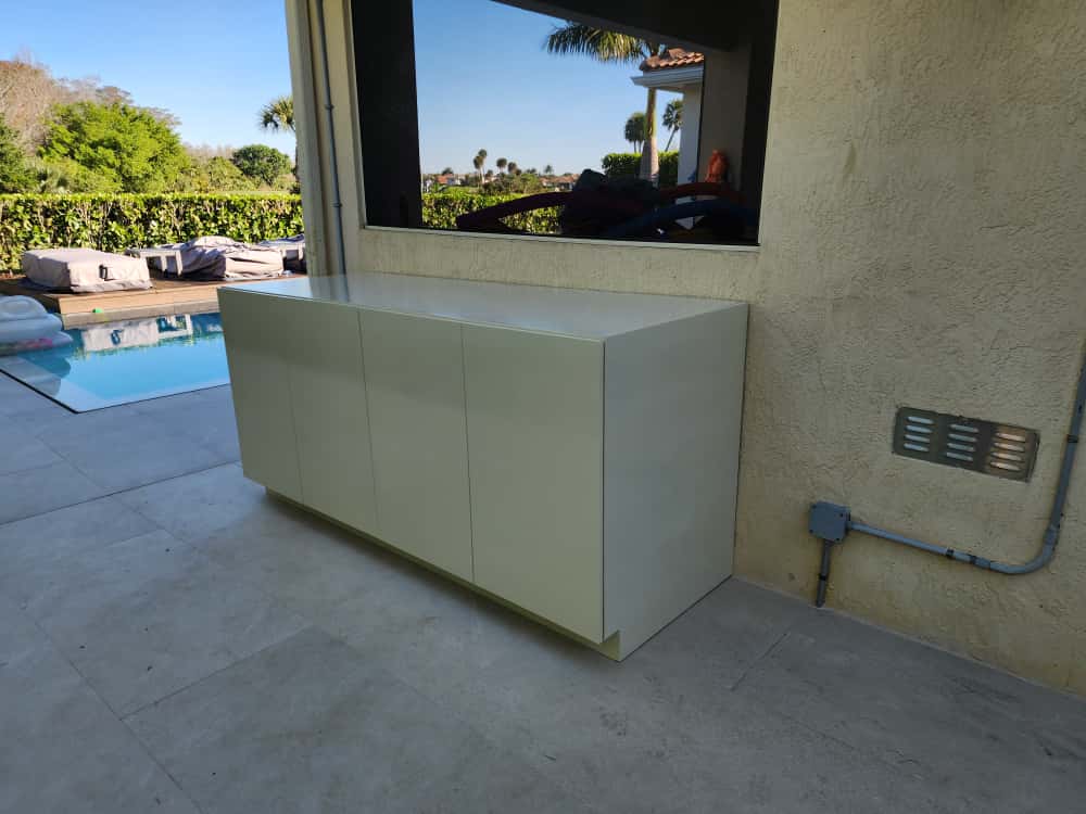 Outdoor waterproof PVC storage cabinet for poolside and patio organization by Evolux Cabinets.