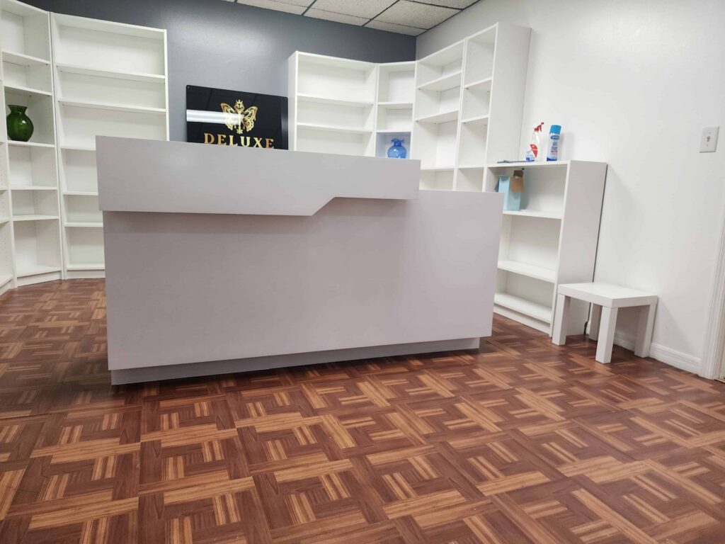 Modern white PVC commercial desk with drawers and wide workspace – waterproof and durable furniture by Evolux Cabinets.
