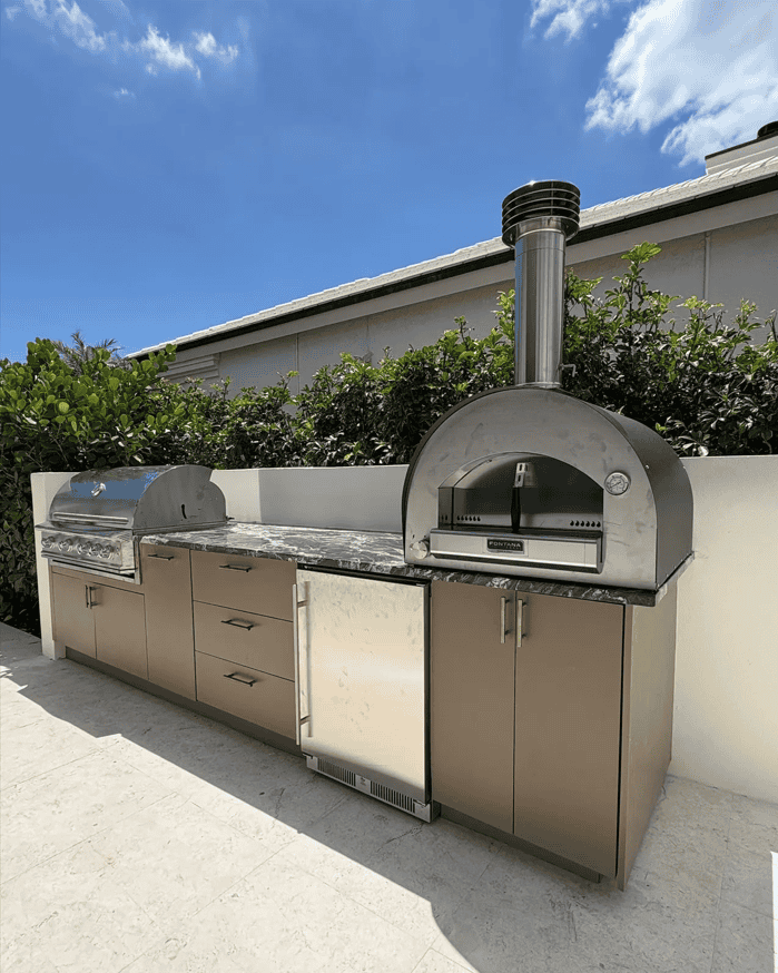 Outdoor kitchen with waterproof PVC cabinets by Evolux Cabinets.